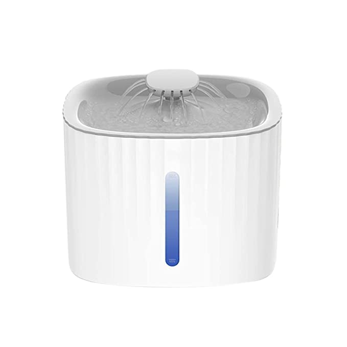 White water fountain with a blue light on a white background