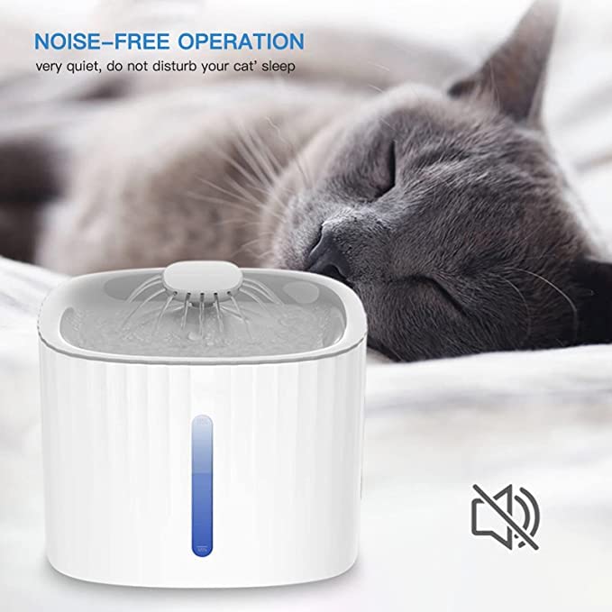 Cat drinking from a white pet water fountain with 'noise-free operation' text above.