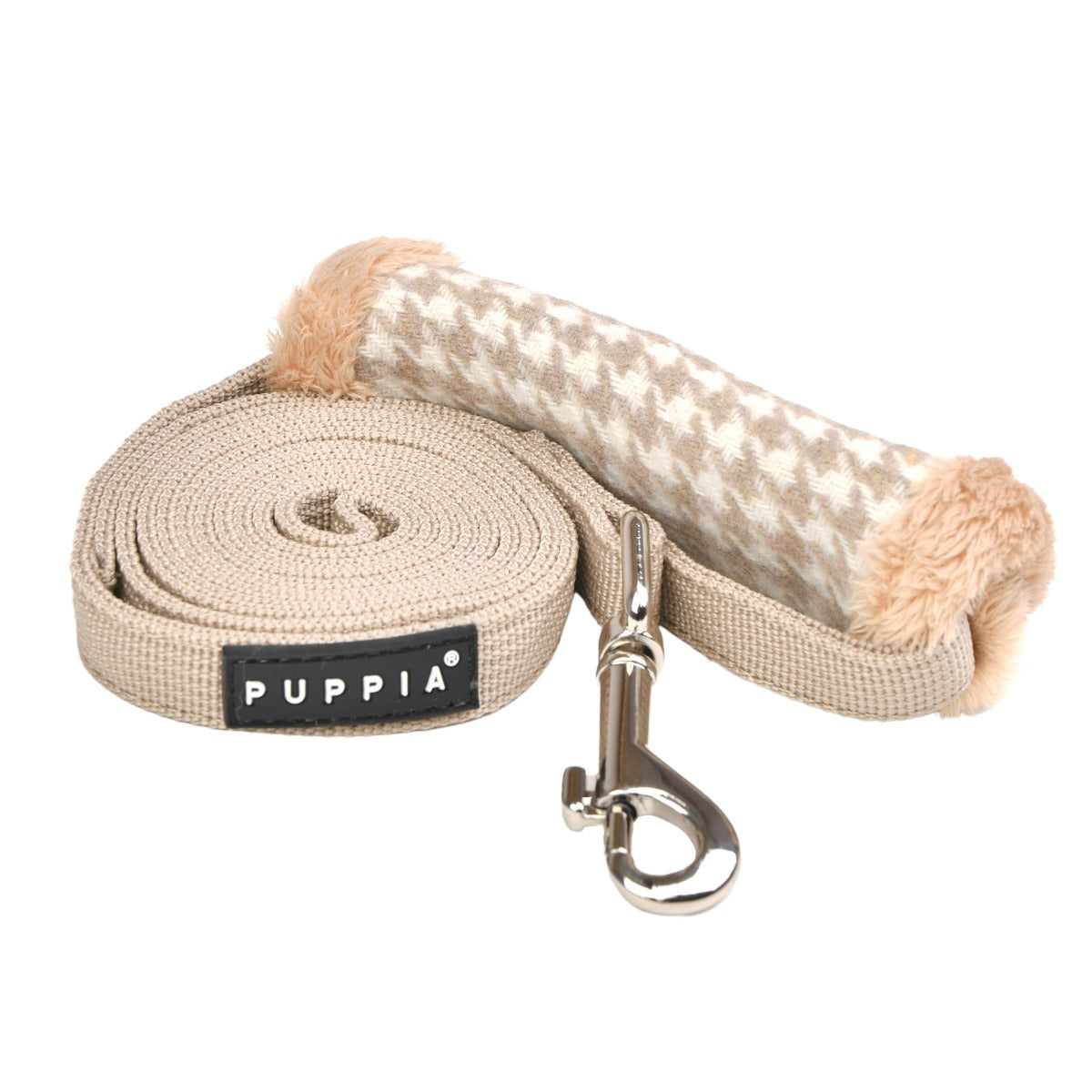 Dog leash with patterned handle and Puppia logo on a white background