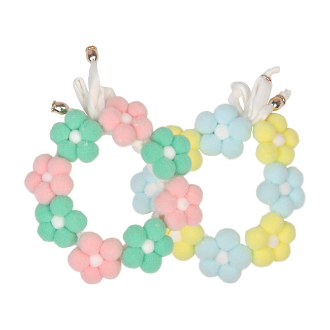 Pastel-colored flower-shaped dog collar or neck accessory