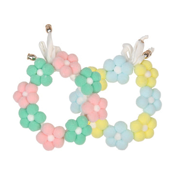 Pastel-colored flower-shaped dog collar or neck accessory