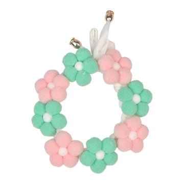 Pastel-colored flower-shaped dog collar or neck accessory
