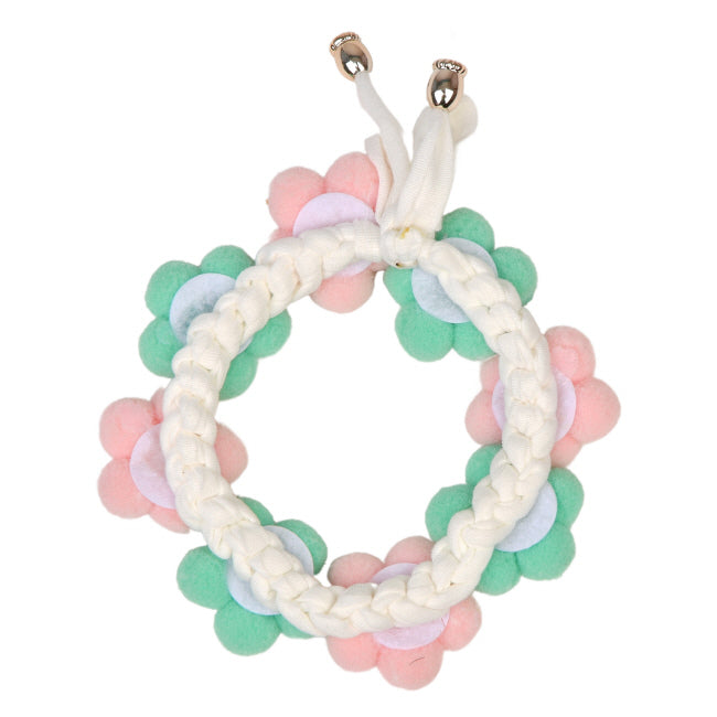 Pastel-colored flower-shaped dog collar or neck accessory