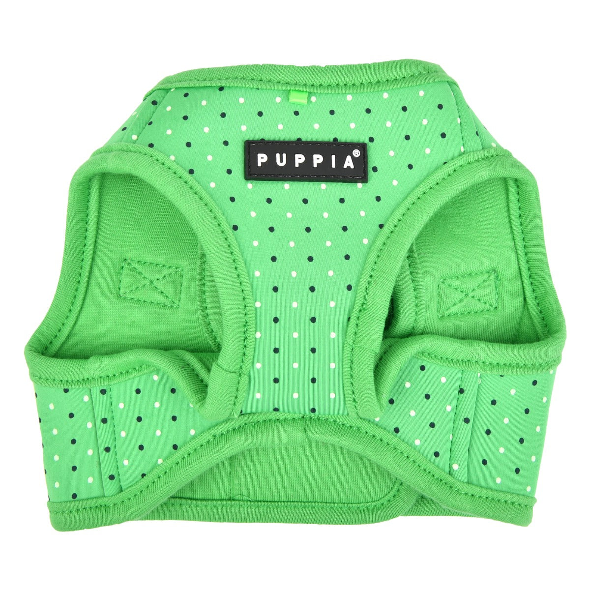 Green dog harness with white polka dots and Puppia logo 