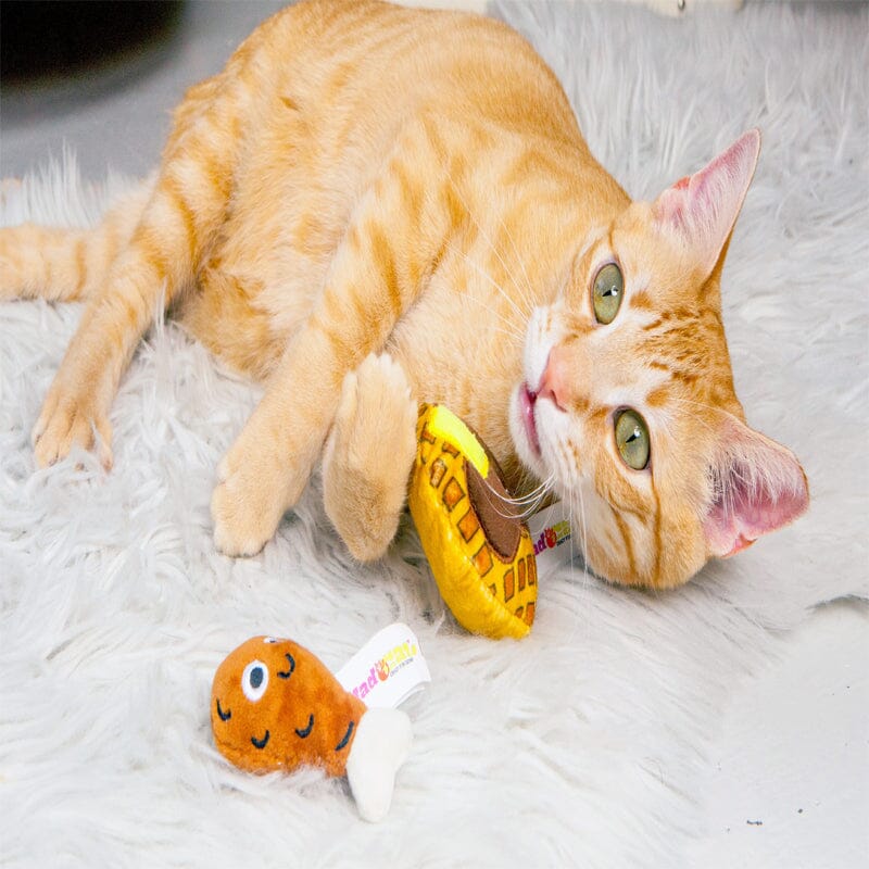Most cats react to catnip by rolling, flipping, rubbing and eventually zoning out. Mad Cat Chicken & Waffles Toy.