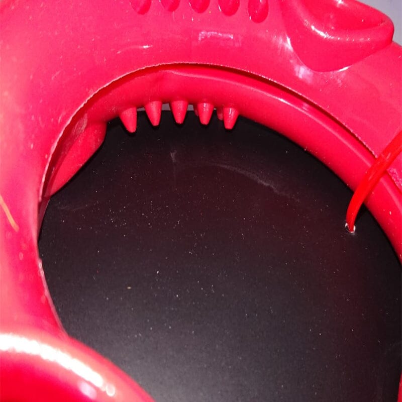 The textures of the Chase 'N Chomp Foraging Ring Dog Toy help clean gums and teeth. 